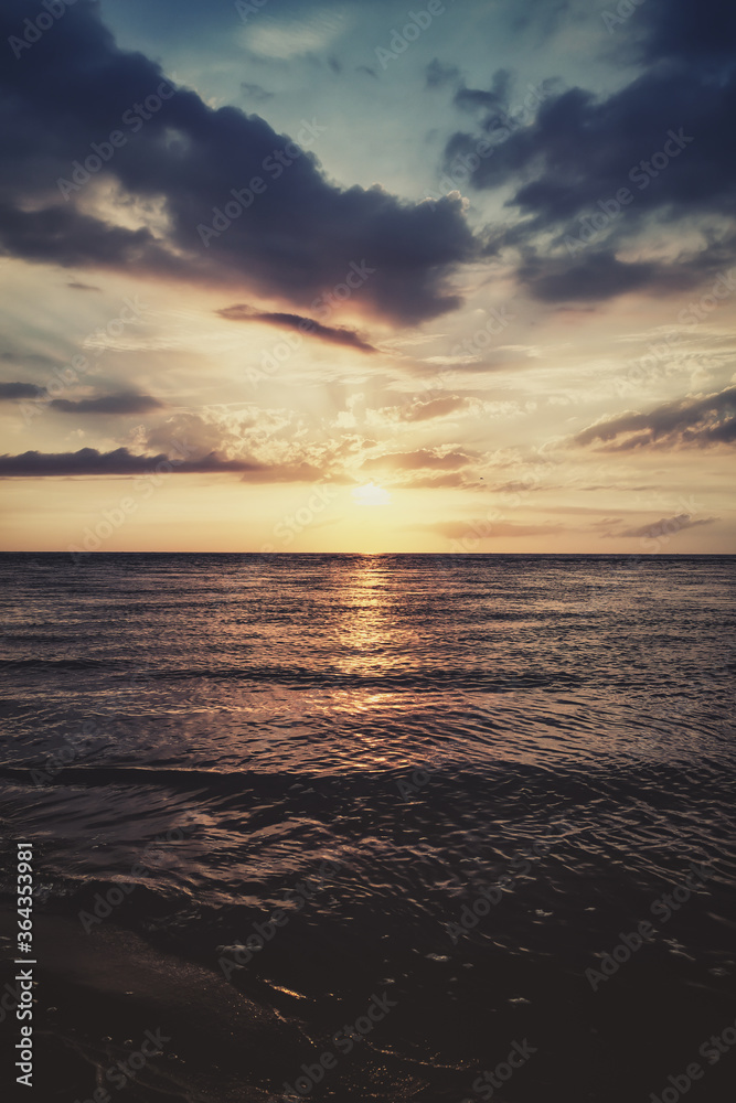 Beautiful Sunset Landscape with Clouds on the Sea.