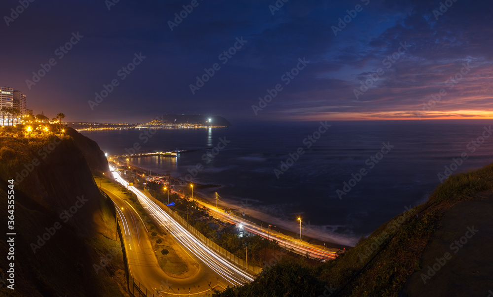 Night Panoramic cityscape of the beach and the highway in Lima, Peru