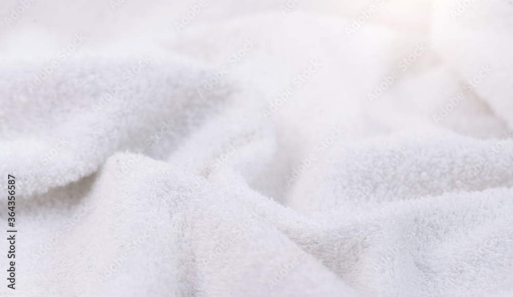 Towel texture closeup. Soft white cotton towel backdrop, fabric background. Terry cloth bath or beach towels. Soft fluffy Textile. Macro, texture Towel texture closeup. Soft white cotton towel backdrop, fabric background. Terry cloth bath or beach towels. Soft fluffy Textile. Macro, texture