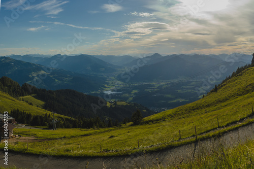 Looking down towards Kitzbuhel aki area and other mountains from the high Kitzbuheler horn on a sunny summer day. photo