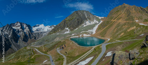 Mountain lake for making snow in winter on the moutains around Solden, Austria, in the summer. © Anze