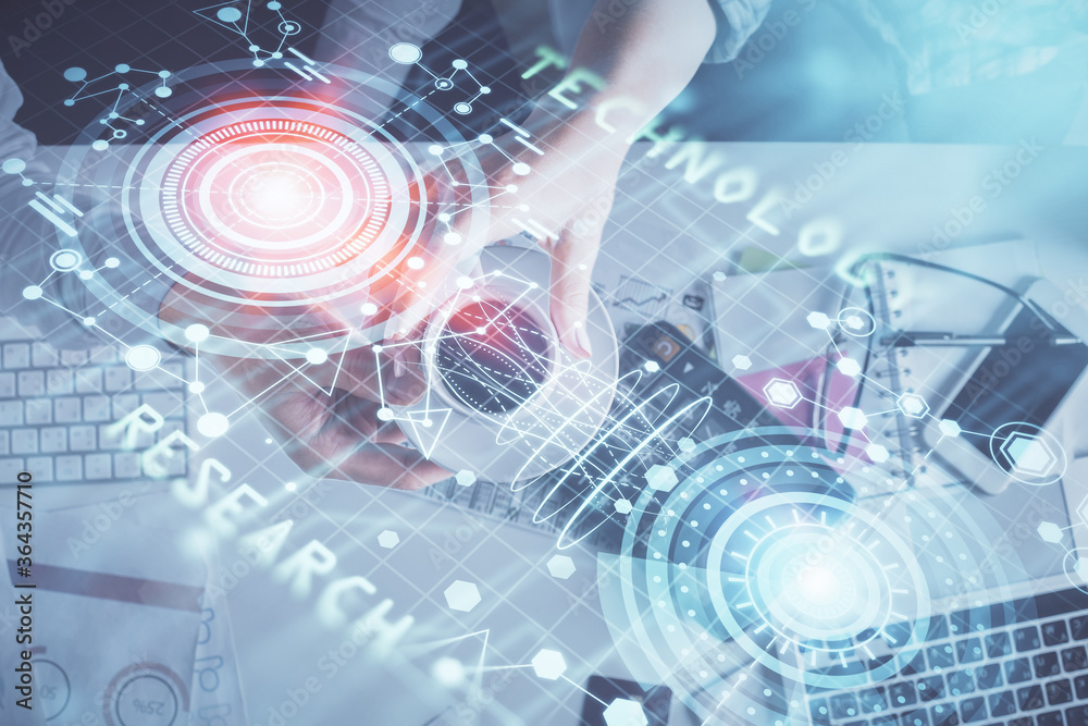 Double exposure of man and woman working together and data theme hologram drawing. Computer background. Top View. Double exposure of man and woman working together and data theme hologram drawing. Computer background. Top View.