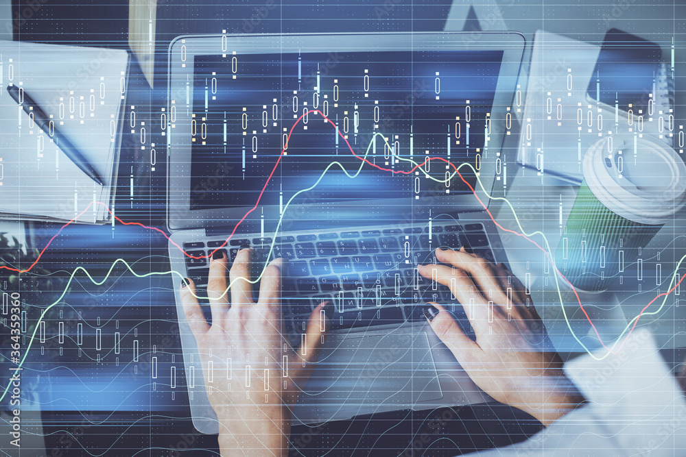Double exposure of woman hands typing on computer and forex chart hologram drawing. Stock market invest concept. Double exposure of woman hands typing on computer and forex chart hologram drawing. Stock market invest concept.