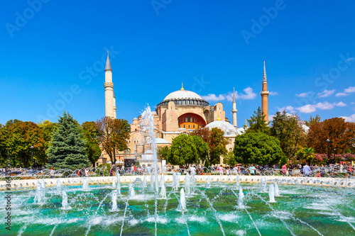 Hagia Sophia Ayasofya museum with fountain in the Sultanahmet Park in Istanbul, Turkey during sunny summer day. From 2020 Hagia Sophia is Mosque