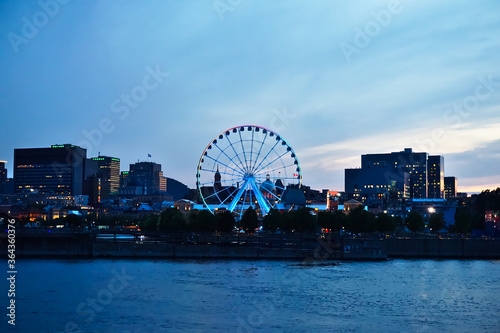 Tableau sur toile Montreal Grand Ferris Wheel in Old Port at the twilight blue hour