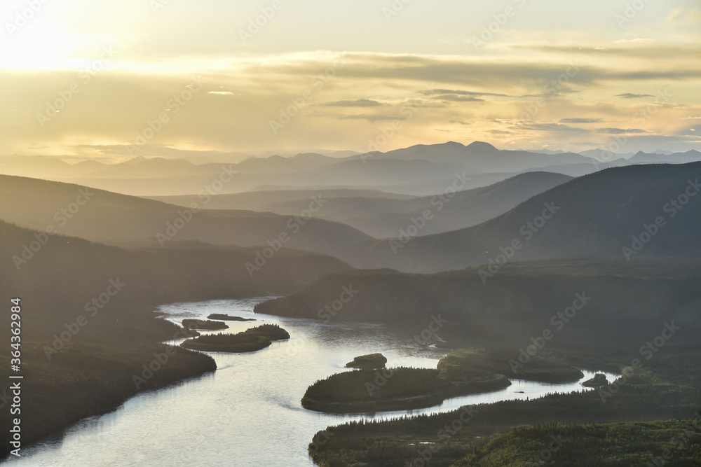 Sunset at the midnight dome above Dawson City overlooking the Yukon River in northern Canada. Taken in the summer time. 