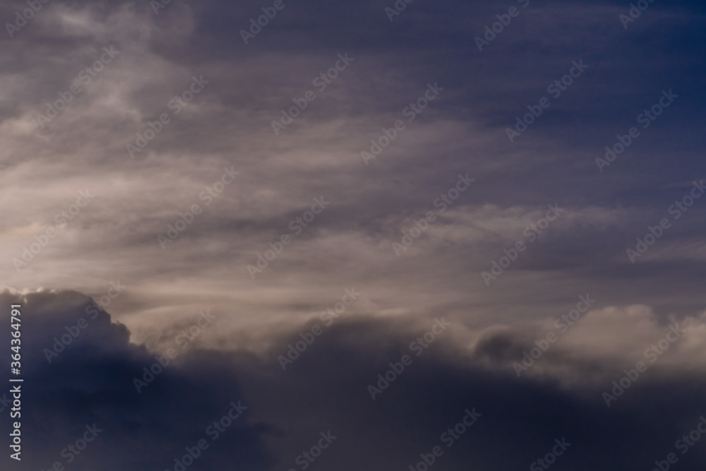 Dark layer of cumulonimbus clouds