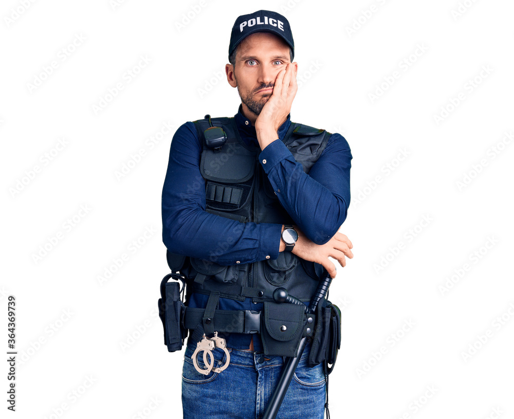 Young handsome man wearing police uniform thinking looking tired and bored with depression problems with crossed arms. Young handsome man wearing police uniform thinking looking tired and bored with depression problems with crossed arms.