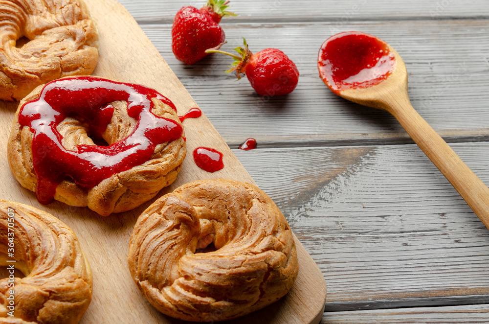 a Homemade Cruller Donuts with strawberry jam