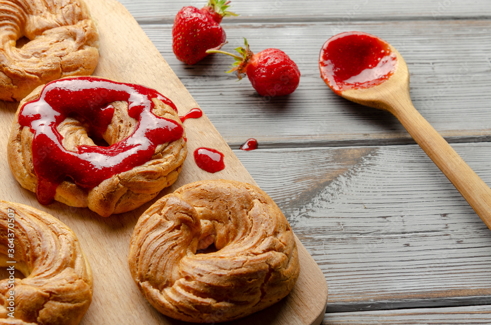 a Homemade Cruller Donuts with strawberry jam a Homemade Cruller Donuts with strawberry jam