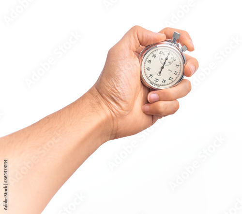 Hand of caucasian young man doing countdown holding stopwatch over isolated white background