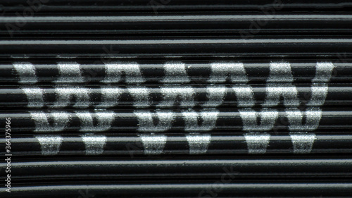 www, texture of letters applied as marking on a computer wire, wire texture, macro