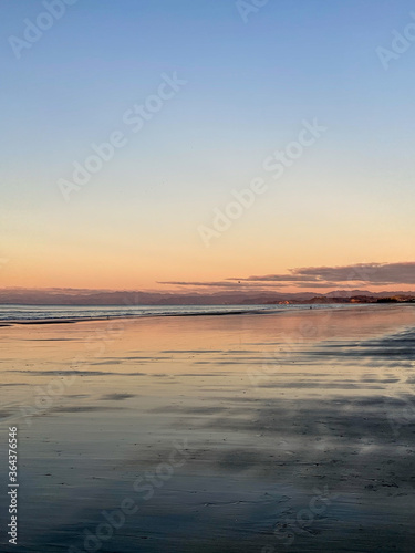 Ohope beach near Whakatane at sunset in New zealand