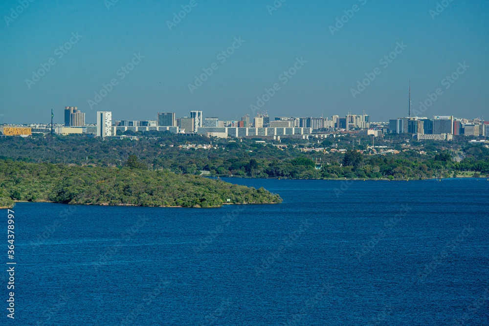 Naklejka premium Brasilia, DF, Brazil on June 13, 2016. Lago Paranoa and the city of Brasilia in the background.