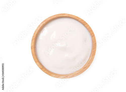 Top view ,Homemade yogurt in wooden bowl isolated on white background.