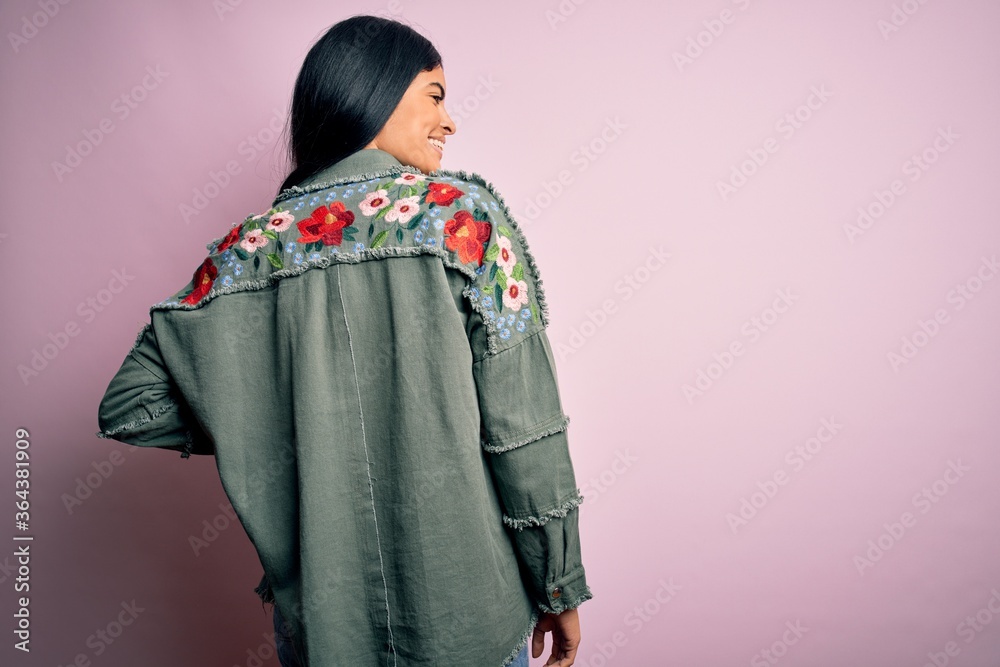 Young beautiful woman wearing fashion urban clothes, model wearing casual street style standing over pink background Young beautiful woman wearing fashion urban clothes, model wearing casual street style standing over pink background