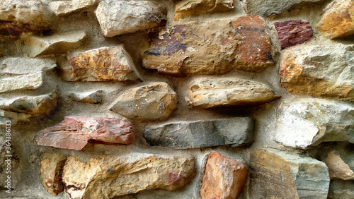Texture wall made of big grey stones.