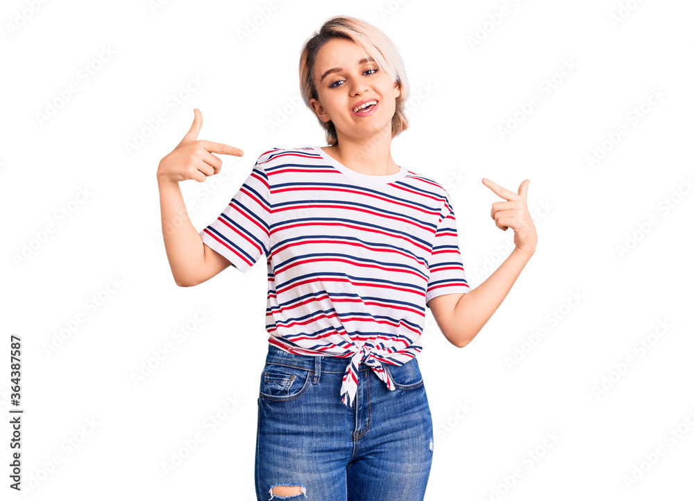 Young beautiful blonde woman wearing casual clothes looking confident with smile on face, pointing oneself with fingers proud and happy. Young beautiful blonde woman wearing casual clothes looking confident with smile on face, pointing oneself with fingers proud and happy.