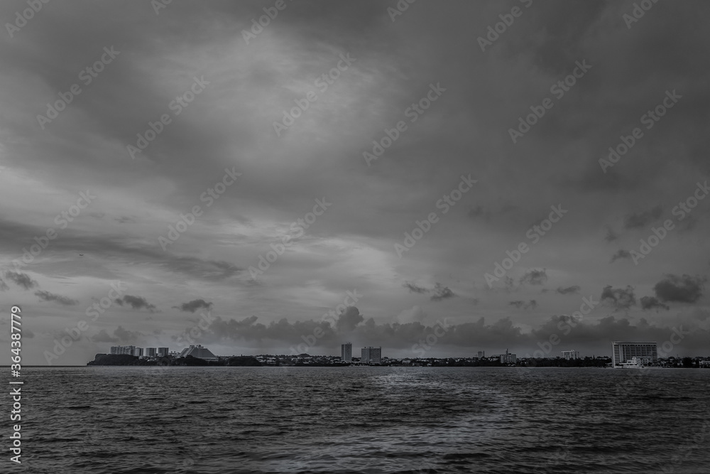 Seascape of the ocean under cloudy sky