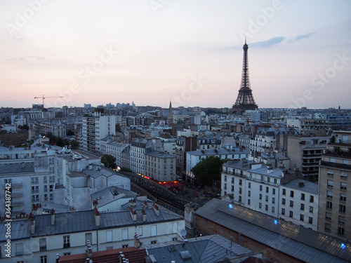 Paris skyline with an impressive Eiffel Tower in the morning sunrise.