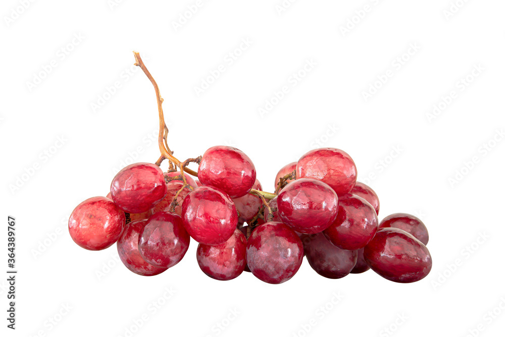 Many red grapes were placed on a white background.