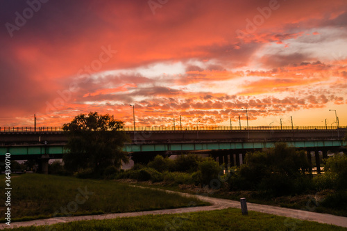 Golden sunset over a rural area park © aminkorea