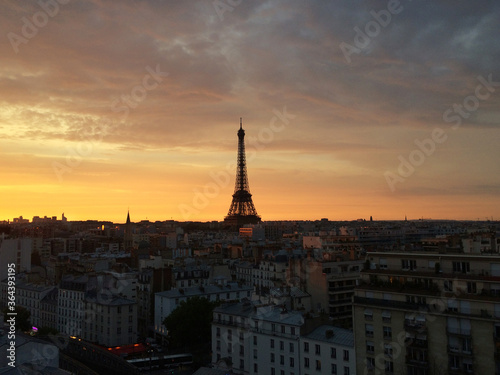 Paris skyline with an impressive Eiffel Tower in the sunrise. © ponkichi9