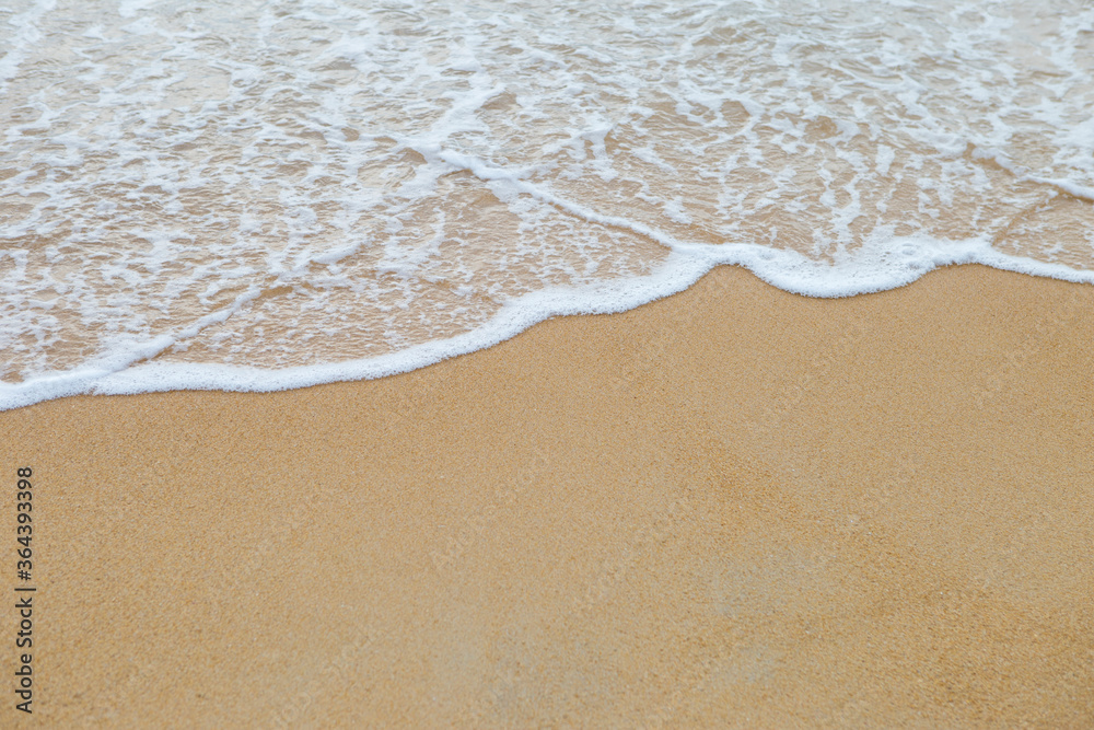 Beautiful clean sand beach with white wave, summer nature background, outdoor day light