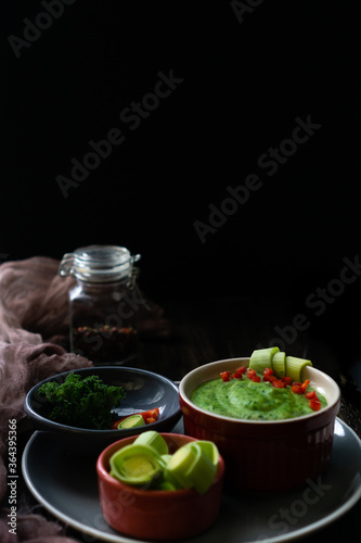Organic healthy diet food served on a dark background