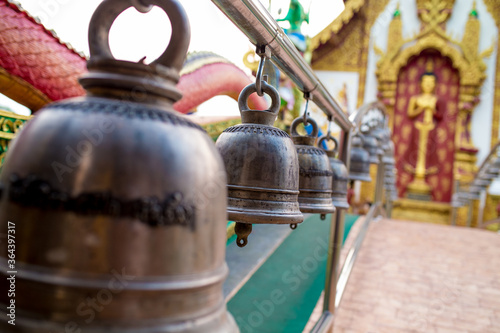 Many bells in the temple allow people to strike to make a loud noise.