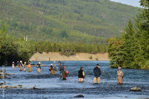 Принти на полотні Anglers fish for sockeye salmon (Oncorhynchus nerka) at the confluence of Alaskaâ€™s Kenai and Russian rivers