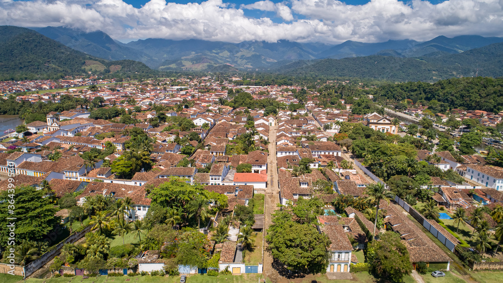 Aerial view to historic town Paraty with green mountains in background on a sunny day, Brazil, Unesco World Heritage
