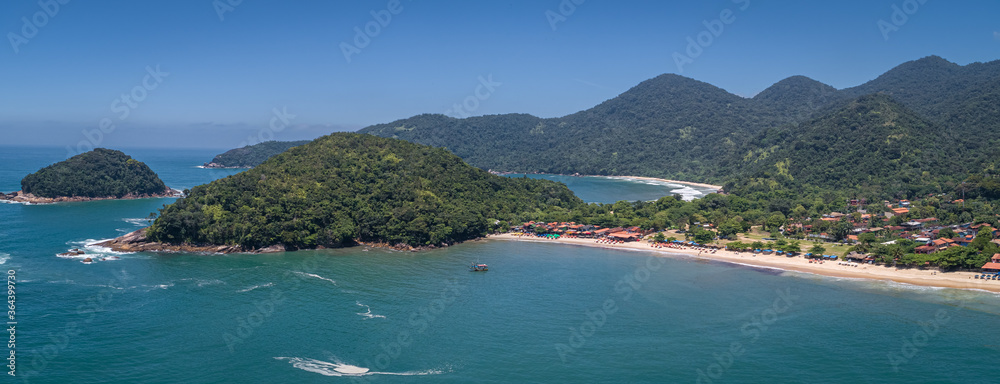 Aerial view to wonderful Green Coast shoreline with islands, bays and mountains covered with Atlantic Forest, Picinguaba, Brazil