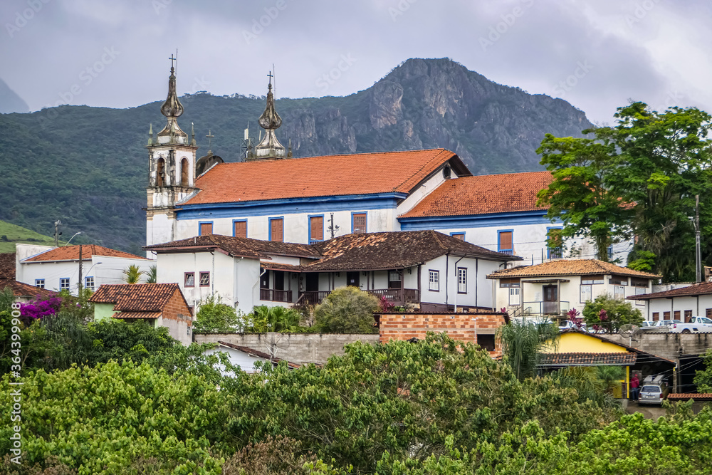 View to historic town Catas Altas with church and mountain in background