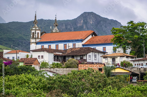 View to historic town Catas Altas with church and mountain in background