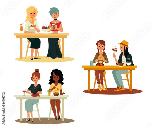 Couple of female friends eating together in cafe - isolated set