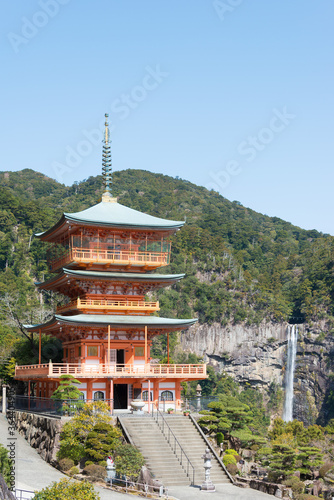 Three-story pagoda with Nachi Falls at Seigantoji Temple in Nachikatsuura, Wakayama, Japan. It is part of the UNESCO World Heritage Site.