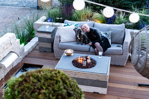 Warm and cozy evening at the gas fire pit table photo