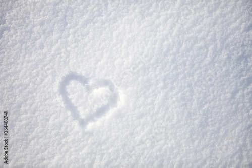man-made heart in the snow