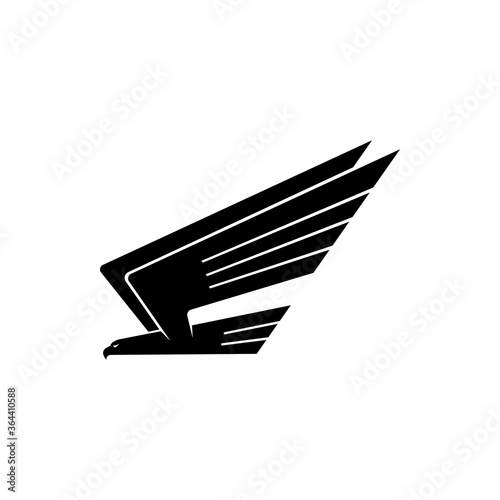 Black bird in flight isolated heraldry symbol. Vector flying hawk, falcon or eagle