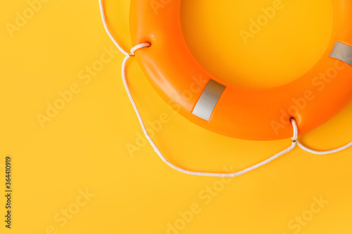 Lifebuoy ring on color background photo