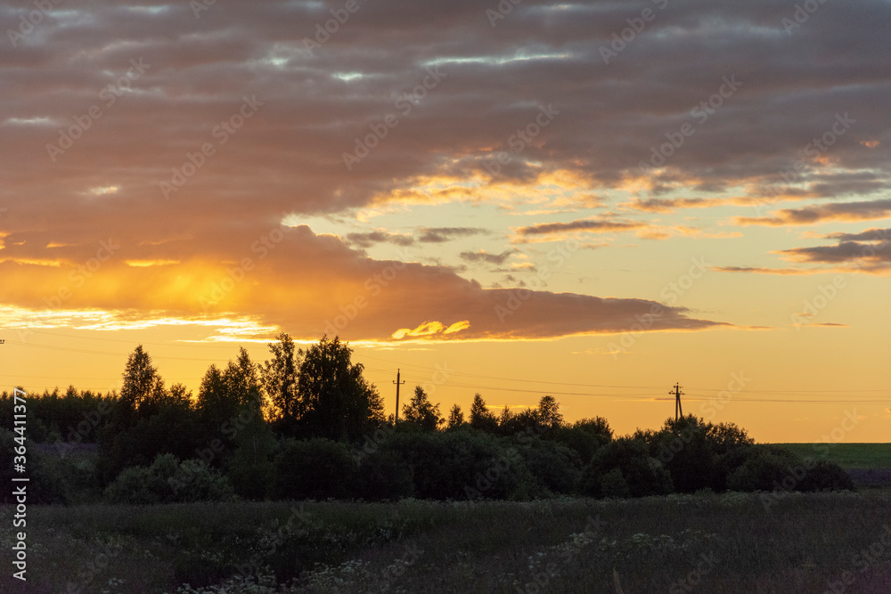 Obraz premium Morning village landscape, Golden sunset over the forest.