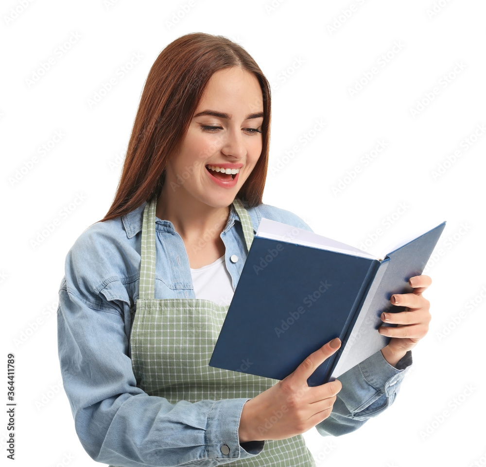 Young woman with recipe book on white background Young woman with recipe book on white background