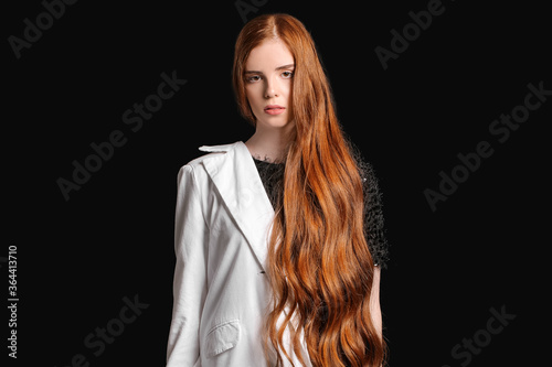 Beautiful young redhead wom...