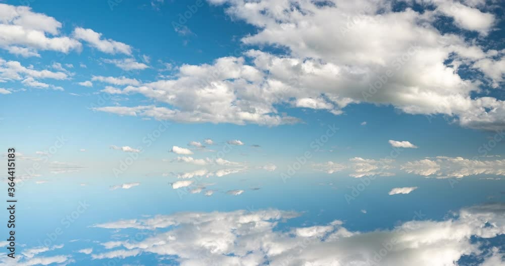 futuristic background consisting of Time lapse clip of white fluffy clouds over blue sky and their reflection, video loop futuristic background consisting of Time lapse clip of white fluffy clouds over blue sky and their reflection, video loop