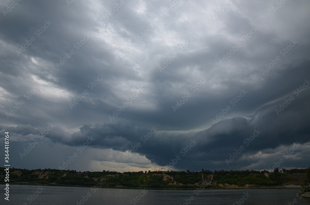Stormy sky over the Ob river. Beautiful clouds. Altai Territory, Russia. July 9, 2020