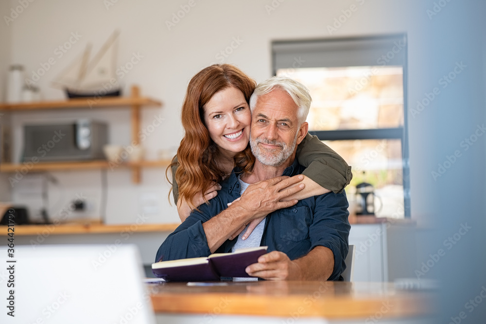 Senior happy couple embracing at home Senior happy couple embracing at home