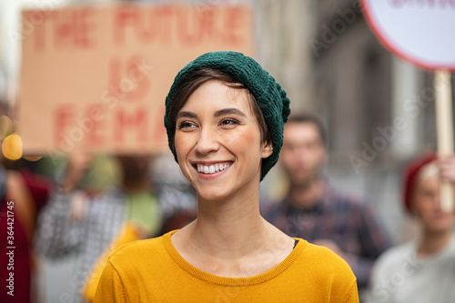Happy smiling woman in protest for female rights photo