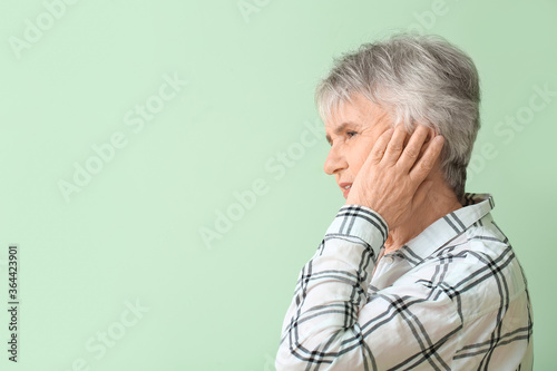 Senior woman suffering from...