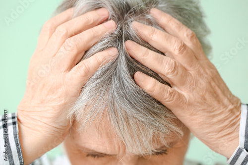 Senior woman suffering from...